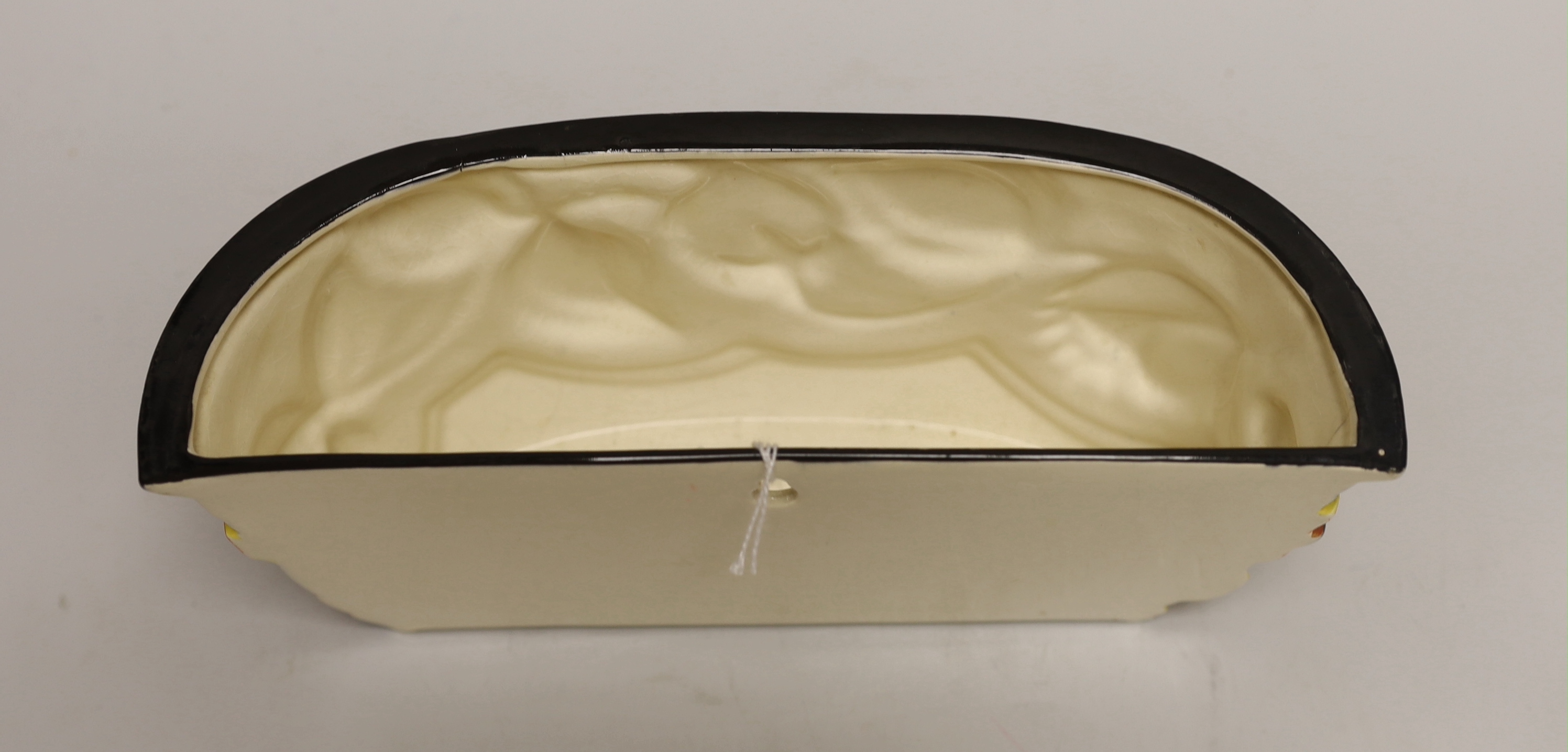 A Clarice Cliff wall vase 26cm wide